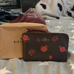Coach Dark Brown Floral Wristlet